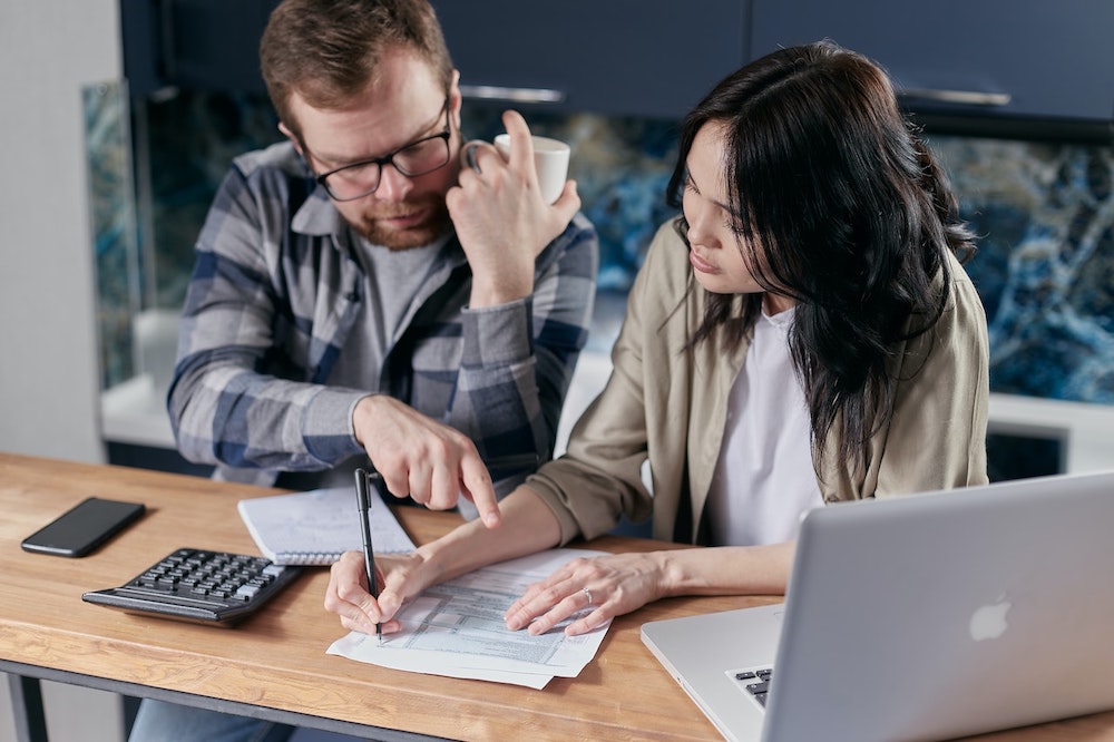 Couple works out finances to cope with mortgage stress